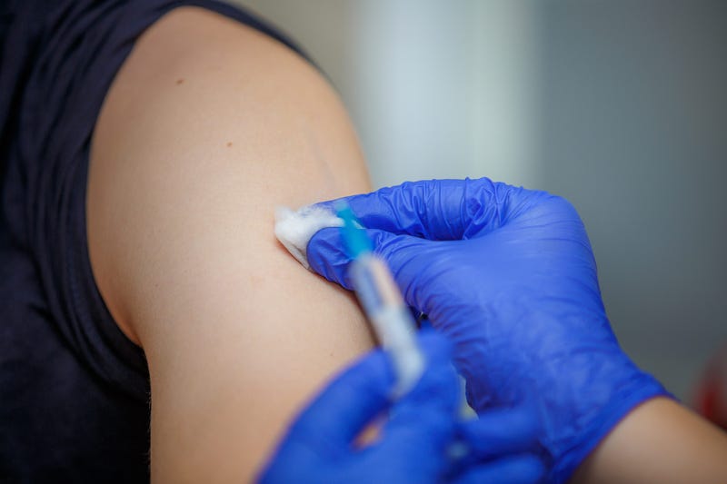 Flu vaccine being administered