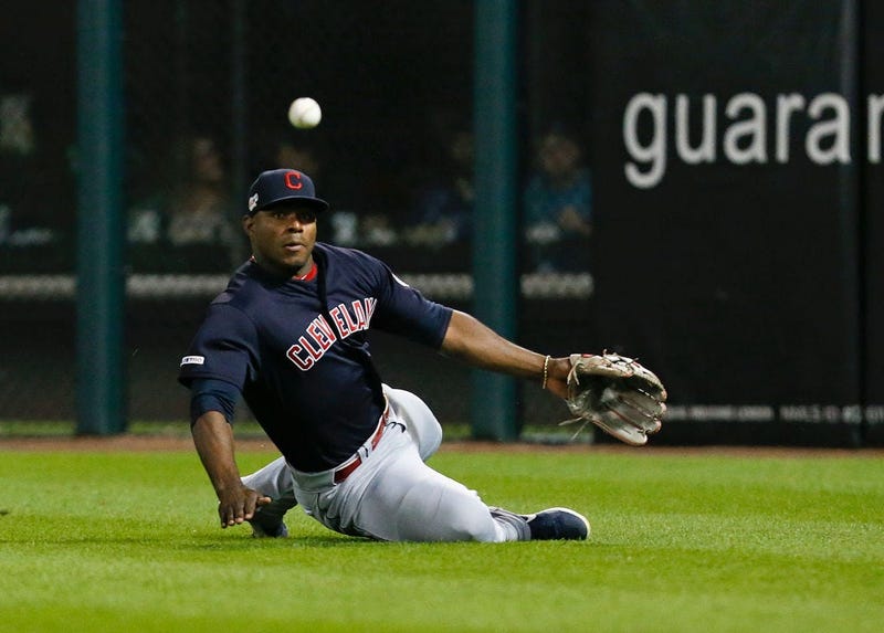CHICAGO, ILLINOIS - SEPTEMBER 26: Yasiel Puig #66 of the Cleveland Indians is unable to catch the RBI triple by Jose Abreu #79 of the Chicago White Sox during the fifth inning of a game at Guaranteed Rate Field on September 26, 2019 in Chicago, Illinois. 