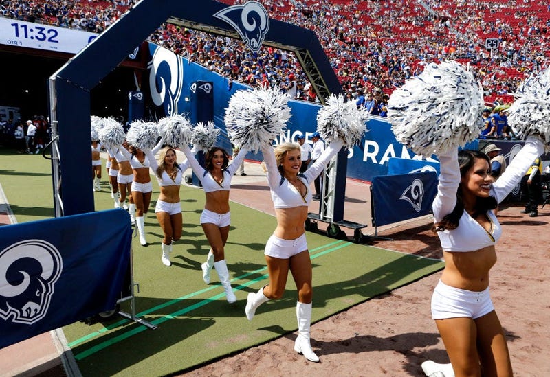 LOS ANGELES, CALIFORNIA - SEPTEMBER 29: The Los Angeles Rams cheerleaders enter the field ahead of a game between the Los Angeles Rams and the Tampa Bay Buccaneers at Los Angeles Memorial Coliseum on September 29, 2019 in Los Angeles, California. (Photo b