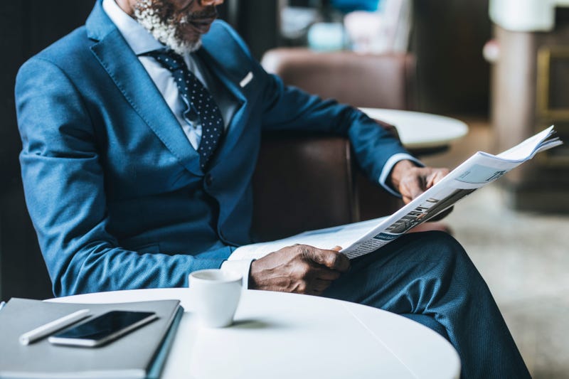 reading newspaper