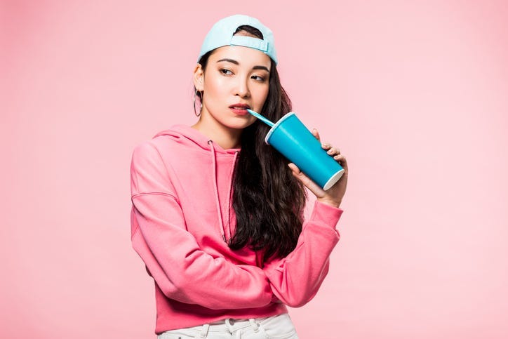 Woman drinking soda