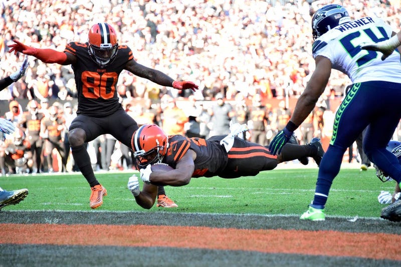 CLEVELAND, OHIO - OCTOBER 13: Jarvis Landry #80 watches as Nick Chubb #24 of the Cleveland Browns scores during the second half against the Seattle Seahawks at FirstEnergy Stadium on October 13, 2019 in Cleveland, Ohio. 