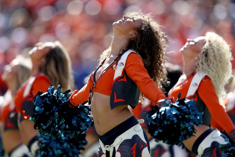 DENVER, COLORADO - OCTOBER 13: Cheerleaders preform after the Denver Broncos score against the Tennessee Titans in the third quarter at Broncos Stadium at Mile High on October 13, 2019 in Denver, Colorado. (Photo by Matthew Stockman/Getty Images)