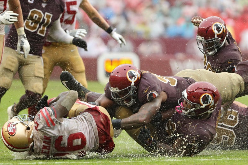 Photos: Rain turns FedEx Field into swamp