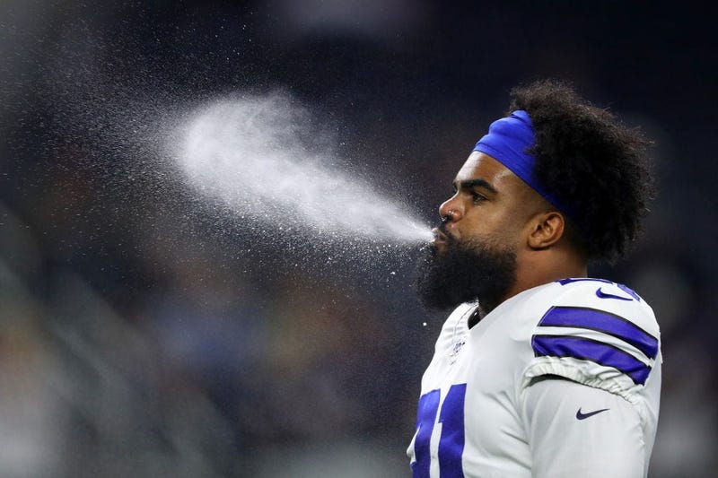 Ezekiel Elliott #21 of the Dallas Cowboys blows water from his mouth before the game against the Philadelphia Eagles at AT&T Stadium on October 20, 2019 in Arlington, Texas. 