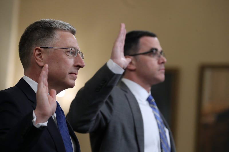 Former State Department special envoy to Ukraine Kurt Volker (L) and former National Security Council Senior Director for European and Russian Affairs Tim Morrison are sworn in before testifying to the House Intelligence Committee on Nov. 19, 2019.