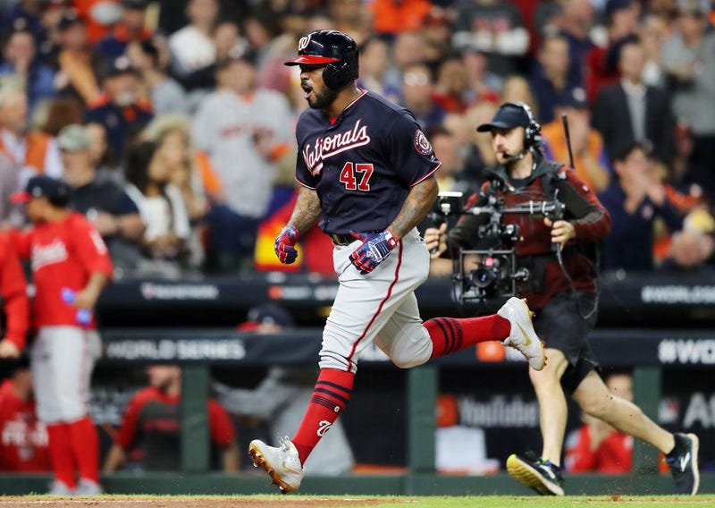 Howie Kendrick #47 of the Washington Nationals hits a two-run home run against the Houston Astros during the seventh inning in Game Seven of the 2019 World Series. 