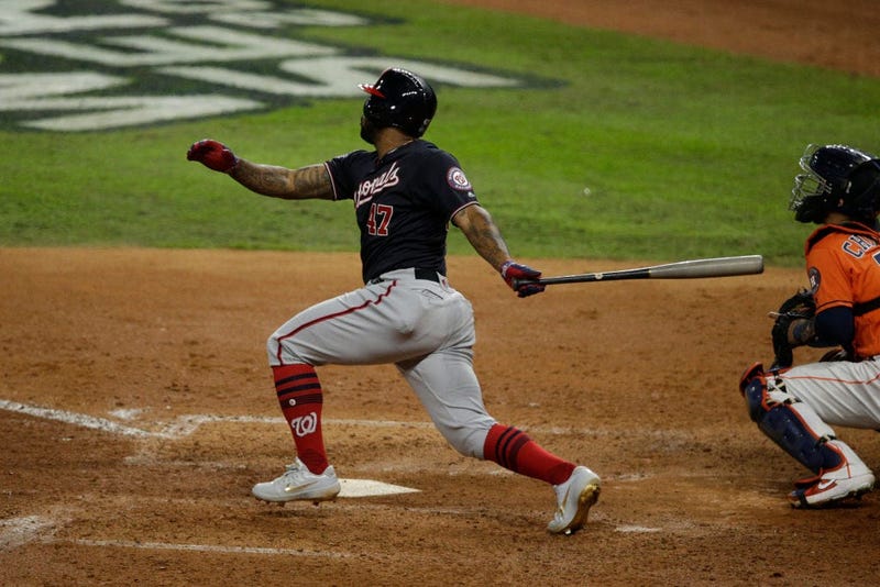 Howie Kendrick #47 of the Washington Nationals hits a two-run home run against the Houston Astros during the seventh inning in Game Seven of the 2019 World Series. 