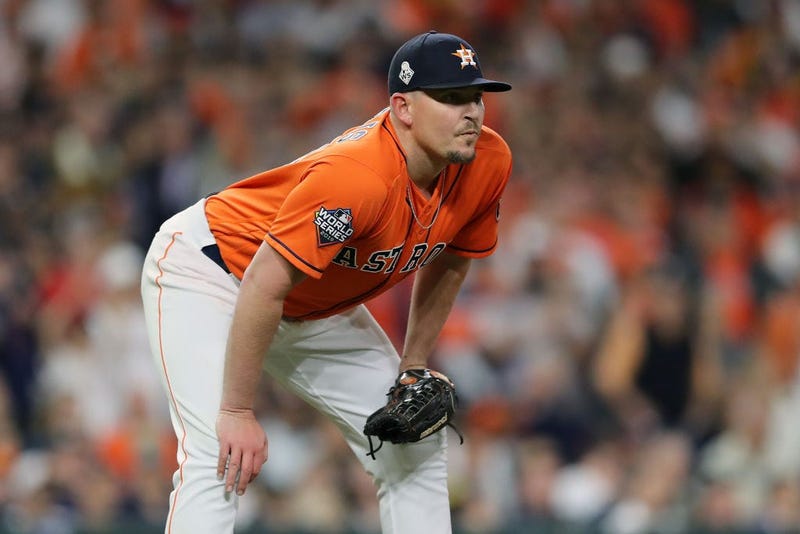 Will Harris #36 of the Houston Astros reacts after allowing a two-run home run to Howie Kendrick (not pictured) of the Washington Nationals during the seventh inning in Game Seven of the 2019 World Series