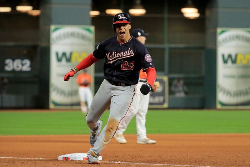 Juan Soto #22 of the Washington Nationals celebrates as he comes home to score a run on a home run by Howie Kendrick (not pictured) against the Houston Astros during the seventh inning in Game Seven of the 2019 World Series. 