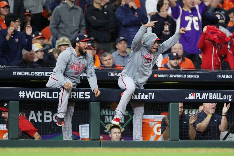 The Washington Nationals celebrate a two-run home run by Howie Kendrick (not pictured) against the Houston Astros during the seventh inning in Game Seven of the 2019 World Series. 