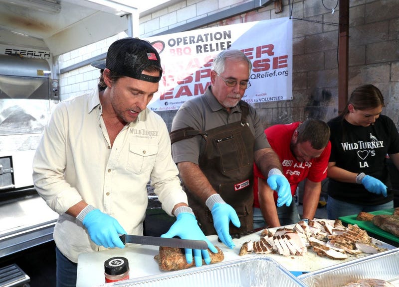 Matthew McConaughey cutting up meat