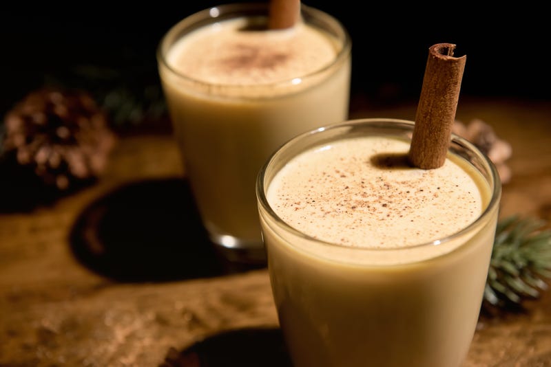 Close up of homemade traditional Christmas eggnog drinks in the glasses - stock photo
