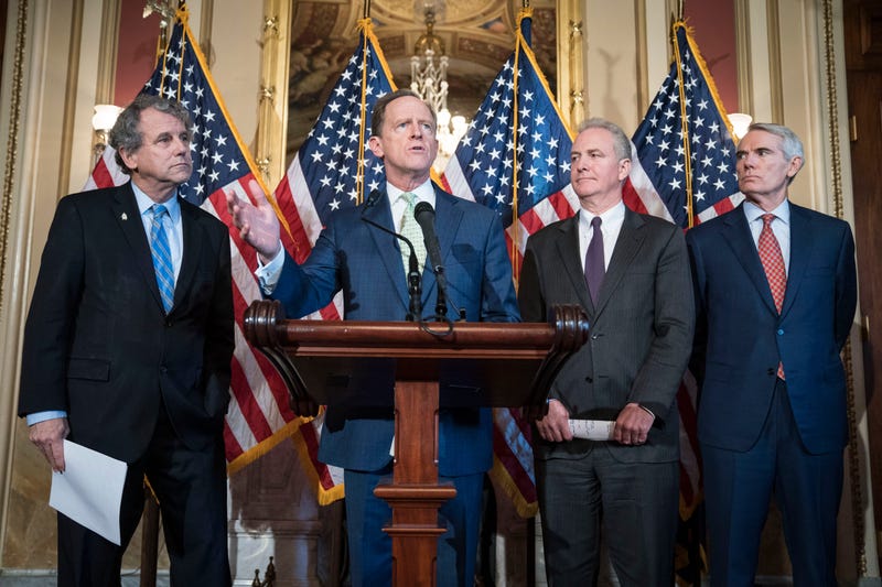 WASHINGTON, DC - DECEMBER 18: Sen. Pat Toomey (R-PA) speaks at a press conference on S.667, the "Otto Warmbier North Korea Nuclear Sanctions and Enforcement Act," with a bipartisan group of Senators and Cindy and Fred Warmbier