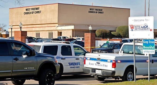 Law enforcement vehicles are parked outside West Freeway Church of Christ where a shooting took place at the morning service on December 29, 2019 in White Settlement, Texas. The gunman was killed by armed members of the church after he opened fire during 