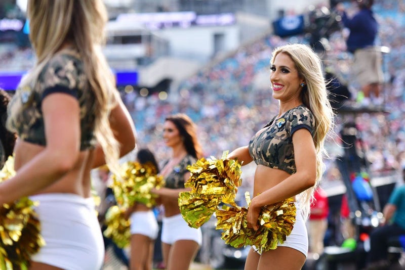 JACKSONVILLE, FLORIDA - DECEMBER 01: A Jacksonville Jaguars cheerleader reacts during a game against the Tampa Bay Buccaneers at TIAA Bank Field on December 01, 2019 in Jacksonville, Florida. (Photo by Julio Aguilar/Getty Images)