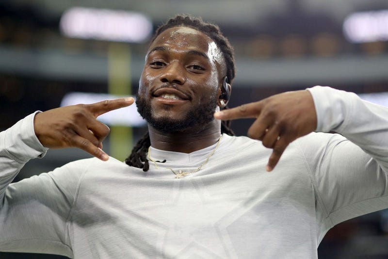 Jaylon Smith #54 of the Dallas Cowboys interacts with fans during pregame warmup before the Dallas Cowboys take on the Los Angeles Rams at AT&T Stadium on December 15, 2019 in Arlington, Texas.