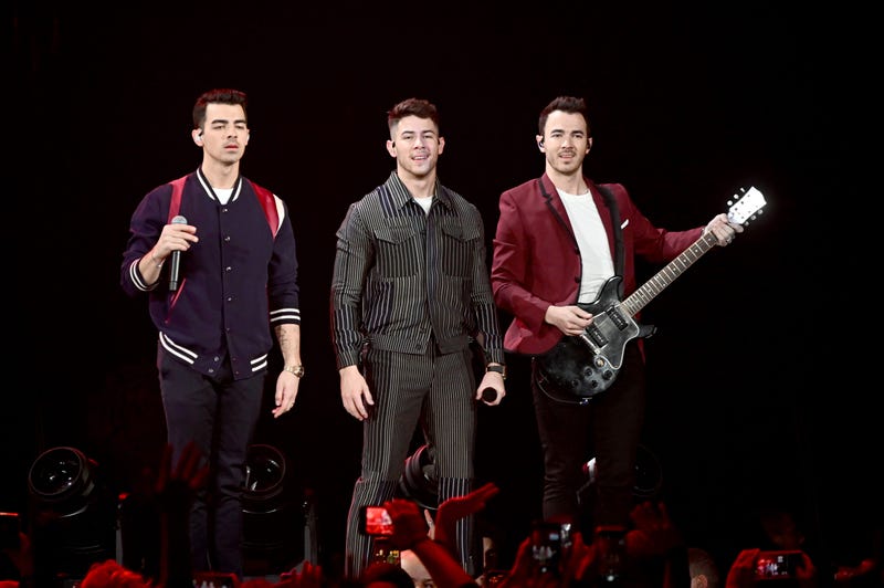 Nick Jonas, Joe Jonas, Kevin Jonas of the Jonas Brothers perform during 103.5 KISS FM's Jingle Ball 2019 - Show on December 18, 2019 in Chicago, Illinois. 