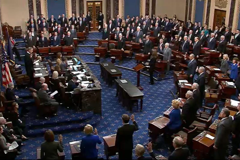  In this screengrab taken from a Senate Television webcast, Supreme Court Chief Justice John Roberts (L) administers the oath to swear in U.S. Senators during pre-trial impeachment proceedings against U.S. President Donald Trump in the Senate.