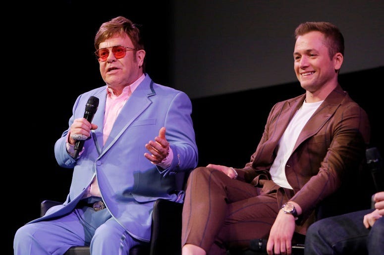 Elton John and Taron Egerton speak onstage during a Special Screening Q&A moderated by Dave Karger in support of Rocketman
