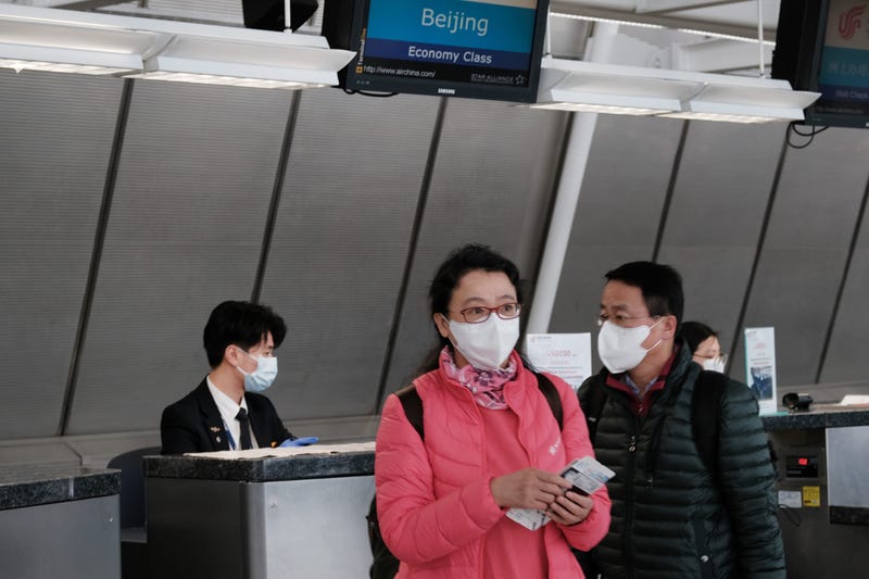 At the terminal that serves planes bound for China, people wear medical masks at John F. Kennedy Airport (JFK) out of concern over the Coronavirus on January 31, 2020 in New York City.
