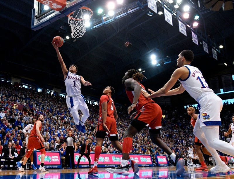 KU and Texas Tech basketball players on the court