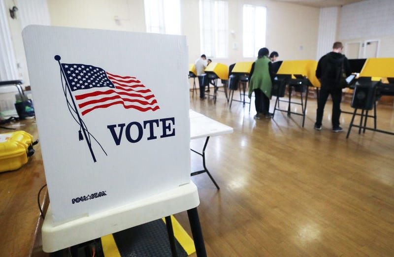 Voters prepare their ballots in voting booths during early voting for the California presidential primary election at an L.A. County 'vote center' on March 1, 2020 in Los Angeles, California.
