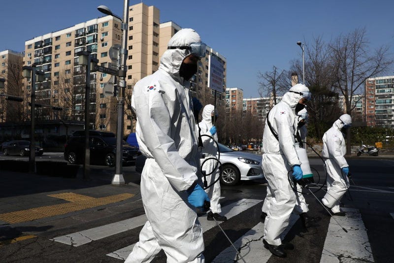 South Korean disinfecting crews