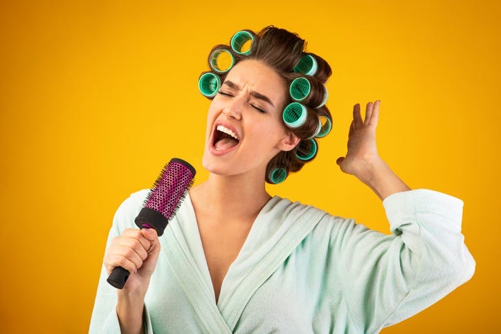 Singing into hairbrush