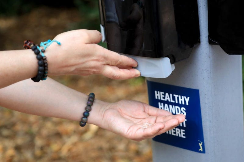 A detail as a fan uses hand sanitizer during a practice round prior to The PLAYERS Championship on The Stadium Course at TPC Sawgrass on March 10, 2020 in Ponte Vedra Beach, Florida.
