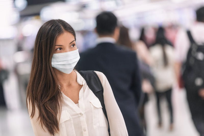 A young woman traveling during the pandemic.