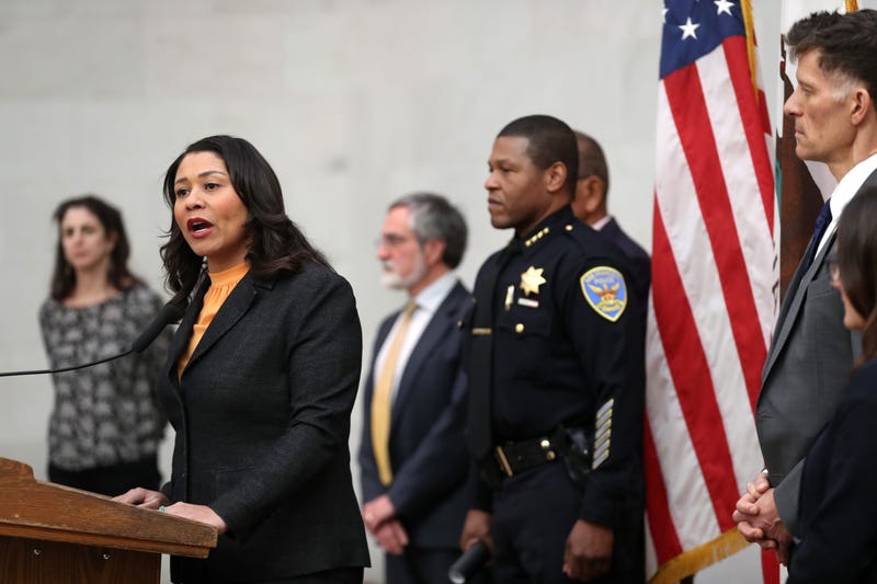 San Francisco Mayor London Breed (L) speaks during a press conference as San Francisco police chief William Scott (R) looks on at San Francisco City Hall on March 16, 2020 in San Francisco, California.
