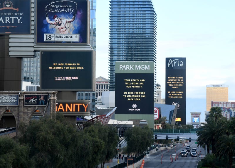 The marquees at the New York-New York Hotel & Casino, Park MGM and the Aria Resort & Casino display messages after the Las Vegas Strip resorts were closed as the coronavirus continues to spread across the United States on March 17, 2020