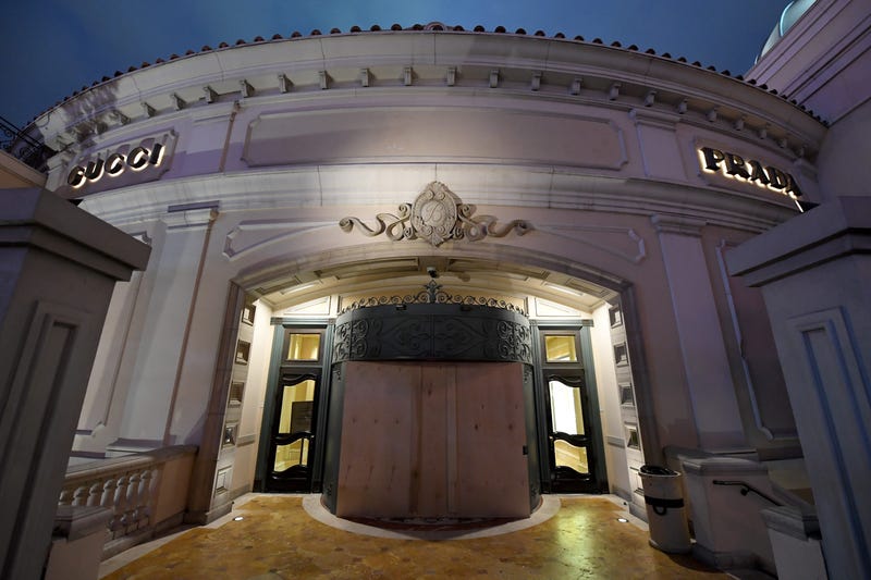 An entrance to the shuttered Bellagio Resort & Casino is boarded up as parts of the Las Vegas Strip go dark