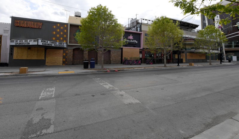 Businesses in the Fremont East Entertainment District are shown boarded up as a result of the statewide shutdown due to the continuing spread of the coronavirus across the United States on March 22, 2020