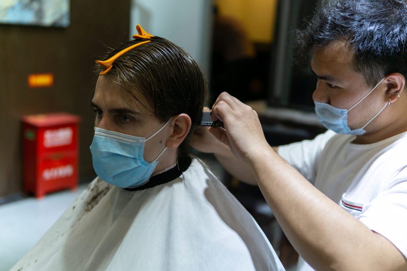 Cutting hair with masks on