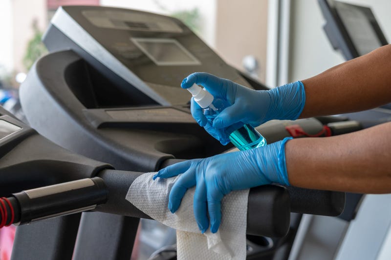 treadmill being sanitized