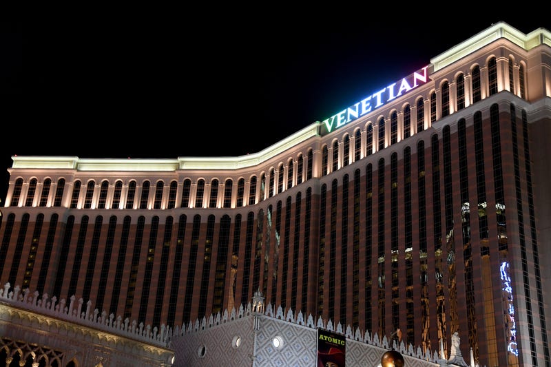 The resort name at the shuttered Venetian Las Vegas on the Las Vegas Strip displays the colors of the Italian flag as a result of the continuing spread of the coronavirus on March 28, 2020 in Las Vegas