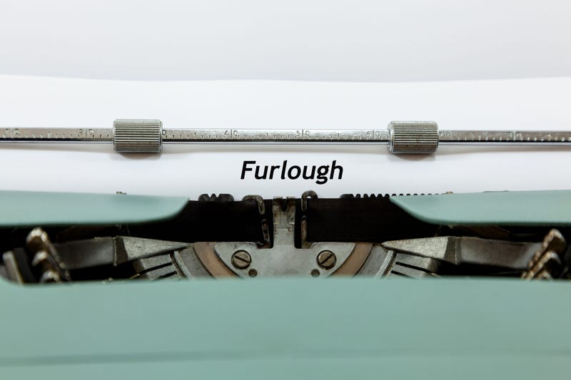 Old fashioned typewriter and paper - with typing that reads 'Furlough'