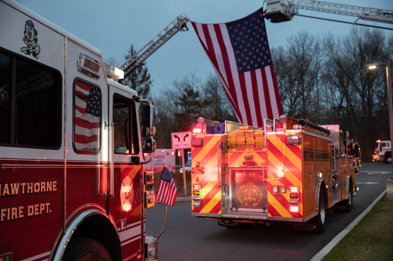 Fire trucks depart the Westchester Medical Center on April 14, 2020 in Valhalla, New York.