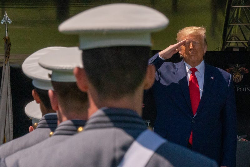 U.S. President Donald Trump salutes cadets at the beginning of the commencement ceremony on June 13, 2020 in West Point, New York.