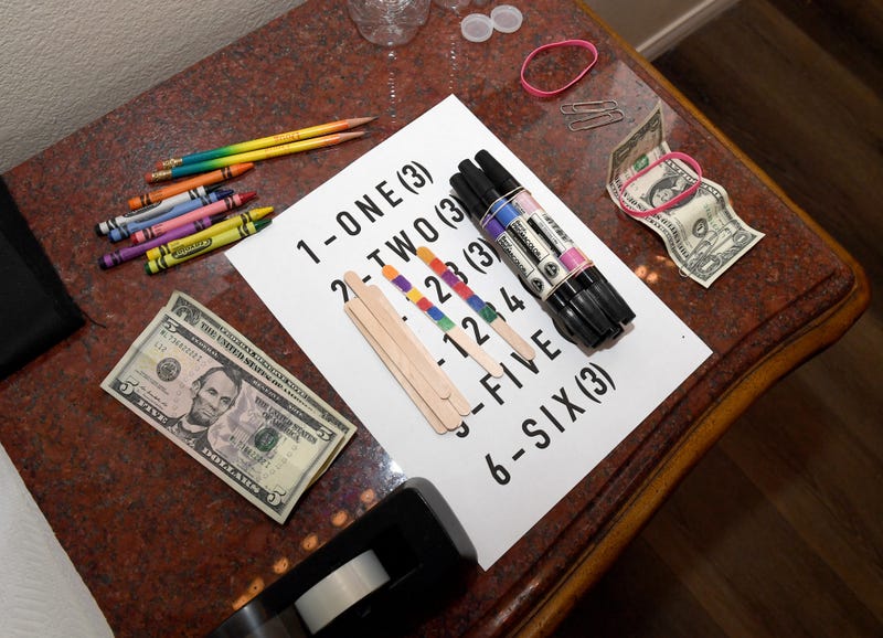 Items for magic tricks are organized before a Facebook Live event held by creative director/magician Douglas "Lefty" Leferovich and magician/comedian Murray SawChuck.