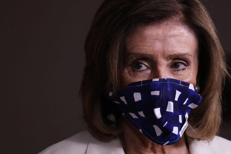 Nancy Pelosi with a mask (GETTY)