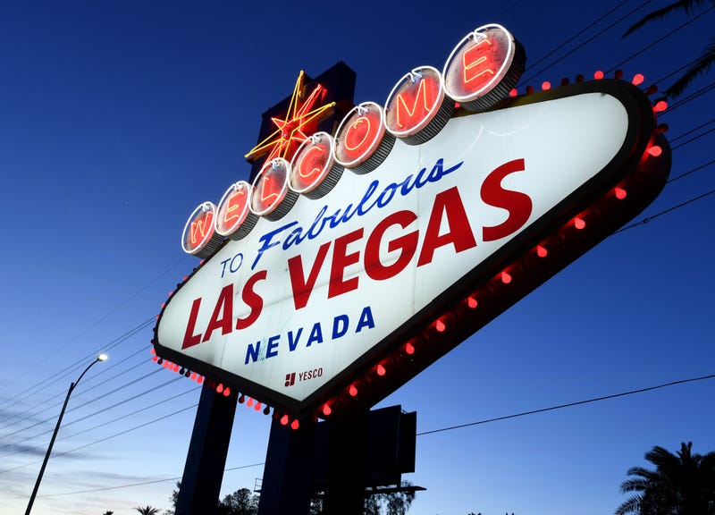 ed lights flicker around the Welcome to Fabulous Las Vegas sign as part of a "red takeover" coinciding with the 37th National Travel and Tourism Week (NTTW) amid the coronavirus pandemic on May 5, 2020 in Las Vegas