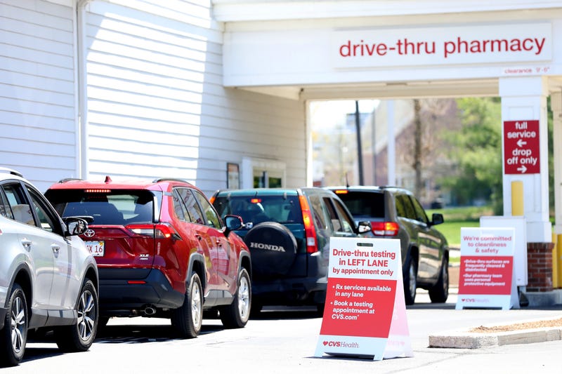 Cars line up for a drive-thru coronavirus (COVID-19) test at CVS Pharmacy on May 15, 2020 in Carver, Massachusetts.