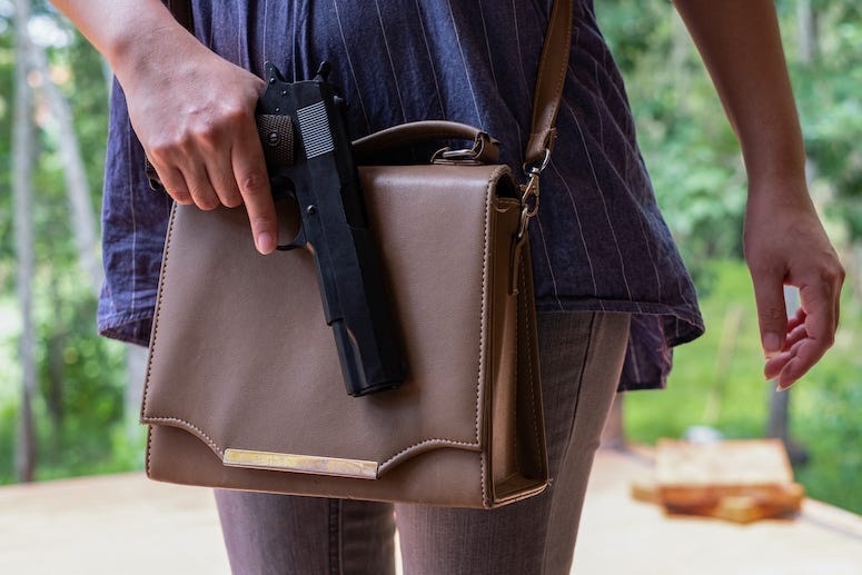 Woman, Gun, Purse