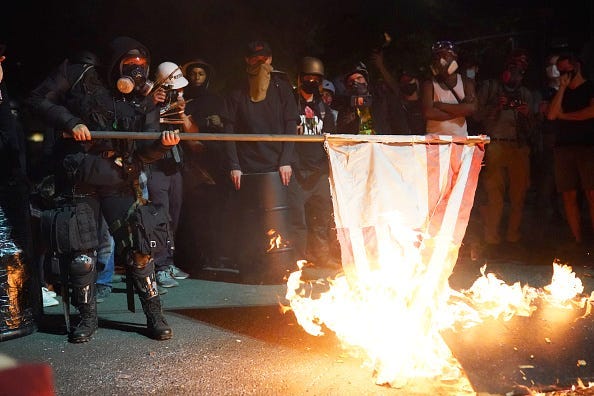 Portland riots burning American flag
