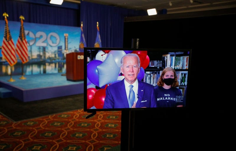 Democratic presidential nominee former Vice President Joe Biden reacts in a video feed from Delaware