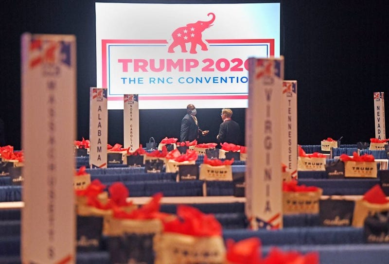 CHARLOTTE, NORTH CAROLINA - AUGUST 24: Republican National Convention delegate talk prior to the start of the first day of the Republican National Convention