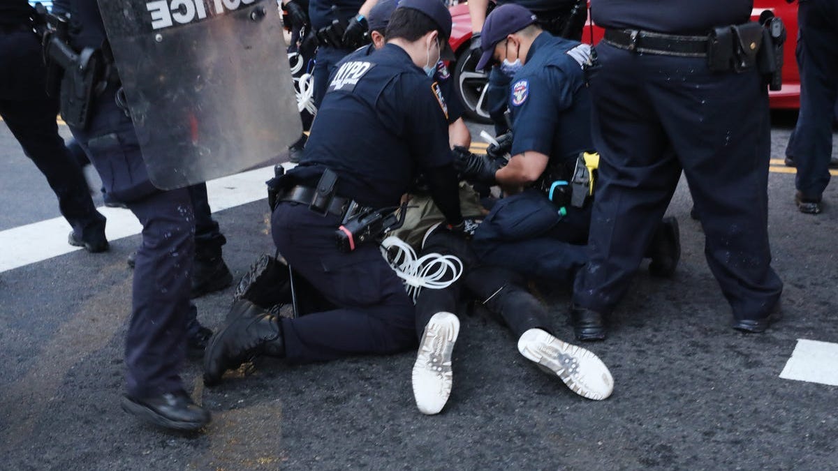 NYC Protests Over George Floyd's Death Lead to Hundreds of Arrests, Multiple Injured Officers, Vandalized NYPD Property